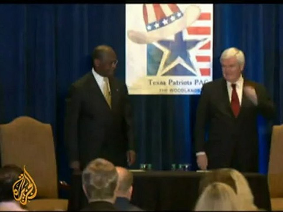 Herman Cain 'suspending' US nomination race