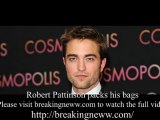 Robert Pattinson packs his bags