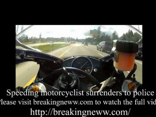 Speeding motorcyclist surrenders to police