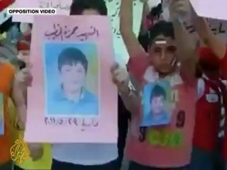 Syria denies boy's killing, sets up panel for talks