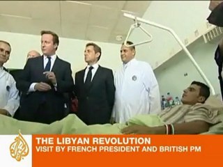 Cameron and Sarkozy visit Libya