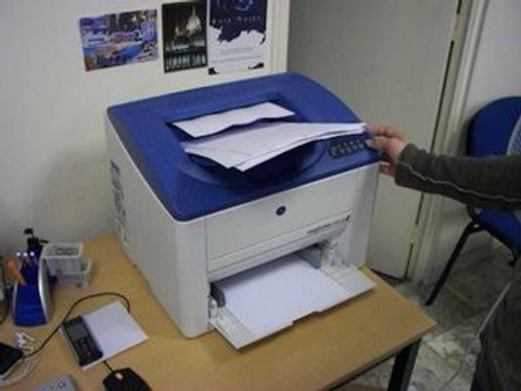 Konica Minolta MagiColor 2500w Cancel