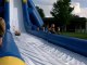 Going Down The Big Inflatable Slide - Again. Terrance has more fun sliding down the inflatable water slide.