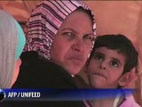 Des réfugiés syriens arrivent dans le premier camp en Jordanie
