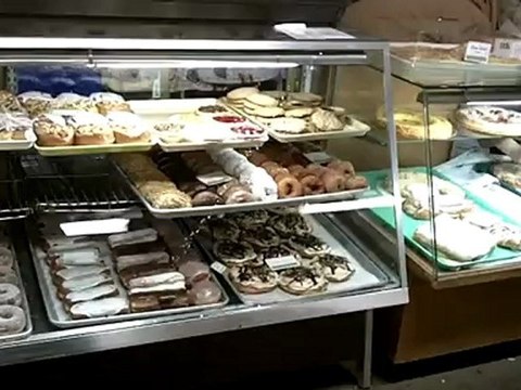 Wrapping Up The Morning - Mr. Hermann brought fresh donuts and pastries to sell at the Royal Oak Farmers Market.