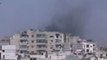 Syria فري برس  حمص تصاعد الدخان من منازل المدنيين في حي الخالدية بحمص  بسبب القصف العشوائي من عصابات الأسد 3 8 2012 Homs
