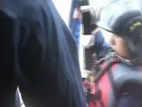 Helicopters rescue typhoon stranded