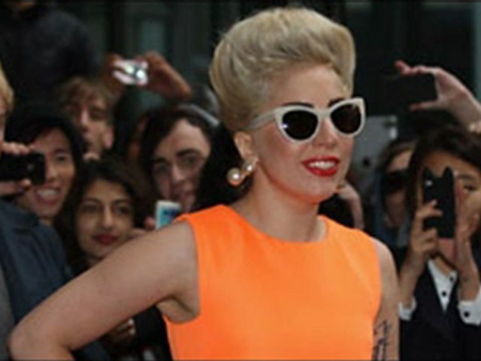 Lady Gaga and Boyfriend Taylor Kinney Share Smooch While Skinny-Dipping