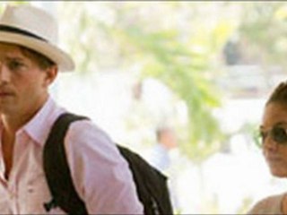 That Mila and Ashton show: Couple's airport PDA