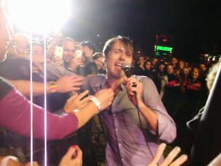 Brett Anderson from Suede walks in front of the audience Lokeren Belgium 8 august 2012