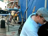 Terrance D. Schemansky Getting Ready To Play at a street festival. Weston, WV.