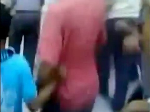 Crowds gather near bodies of pro-Assad officers