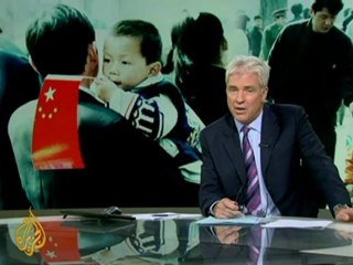 China vows to probe 'forced abortion photo'