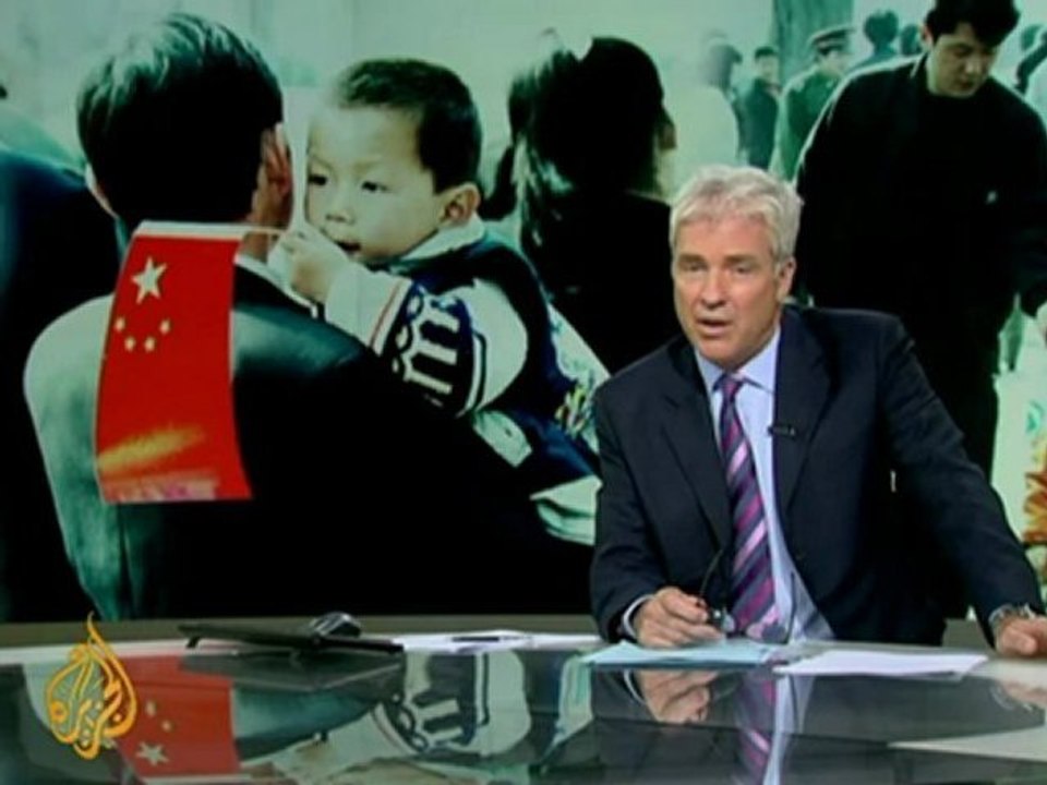 China vows to probe 'forced abortion photo'