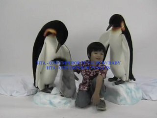 Automate peluche manchot