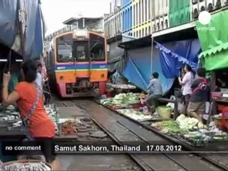 Thailand railway track market - no comment