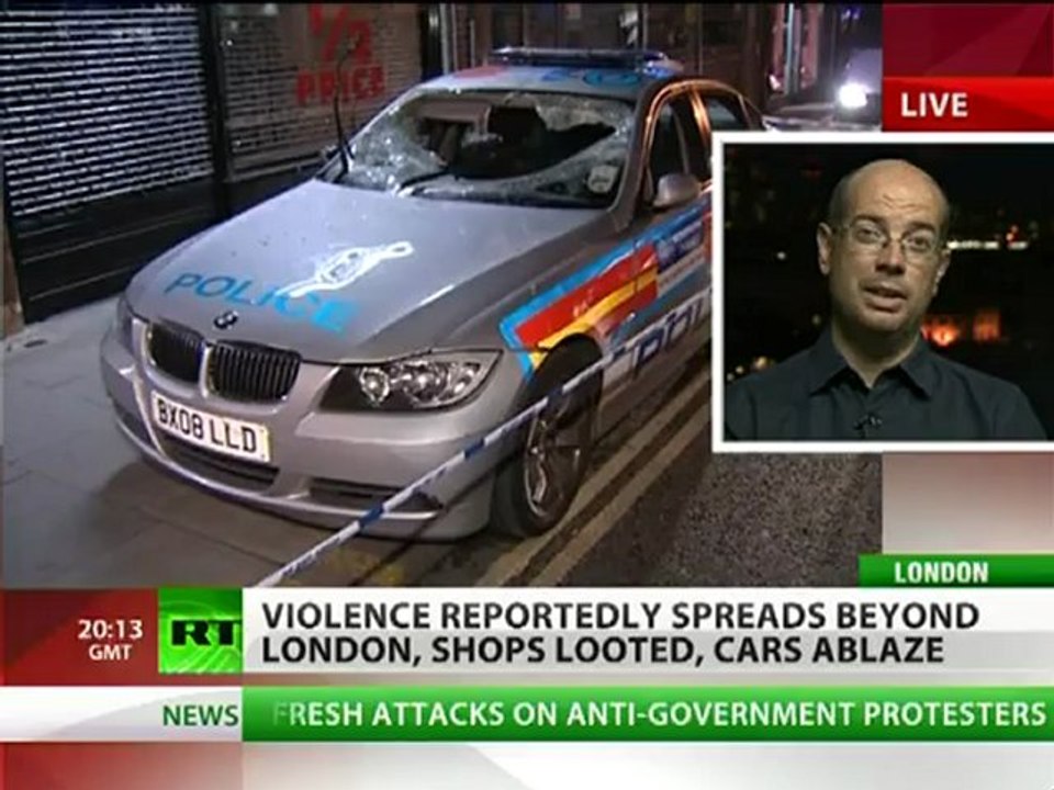 London riots: Telegraph editor pulled off bike on way for RT LIVE