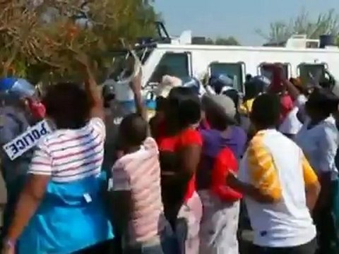 South African miners appear in court amid protests