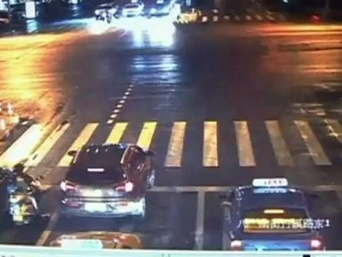 Car drives over girl's head after motorbike fall in China