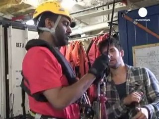 Greenpeace campaigners climb Russian Arctic oil platform