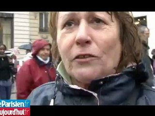 Sur les Champs-Elysées, les badauds trempés mais fiers d'avoir salué leur président