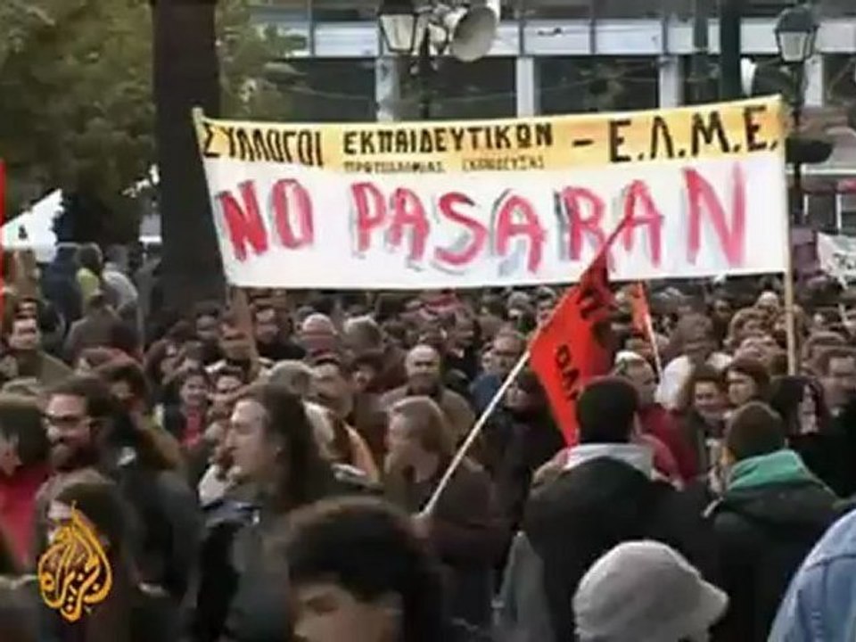 Police and protesters clash in Athens