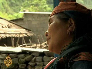 Nepal flood victims suffer one month on