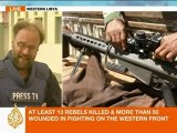Libyan rebels battle for western towns