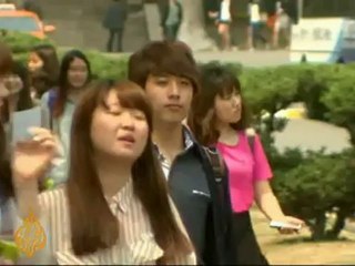 South Korean expats sign up for army