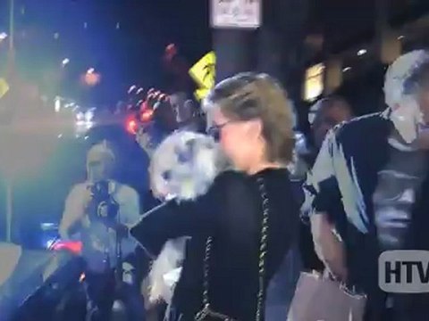 Coton de Tulear: Avid Dog Lover, Jane Fonda, And Pooch Dine Out.