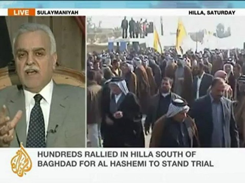 Iraqi Vice-President Tariq al-Hashemi speaks to...