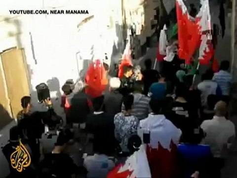 Bahrain police clash with mourners