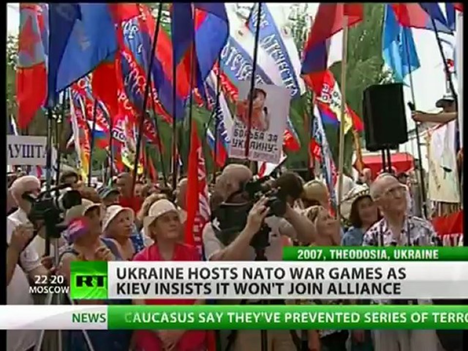 War Games: Ukraine plays with NATO as locals sling mud at military