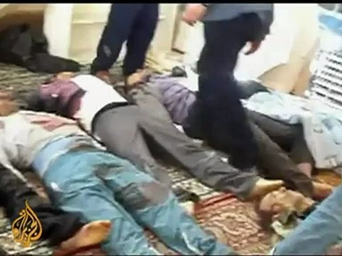 Battered Syrian town still defiant against Assad