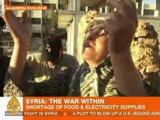 Exclusive: Syrians strive to survive in 'frontline' town