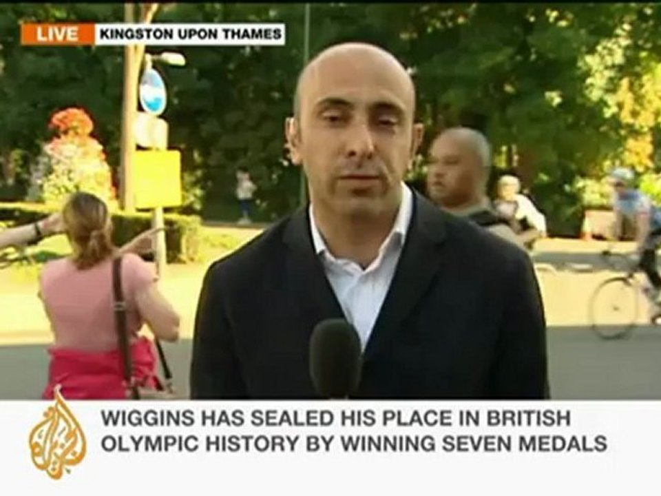 Bradley Wiggins wins Olympic cycling time trial