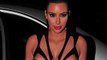 Kim Kardashian Nearly Suffers a Wardrobe Malfunction in a Very Revealing Cut-Out Dress