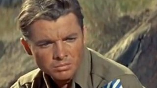 The most decorated soldier in American history, Audie Murphy, relives his war experiences in To Hell and Back