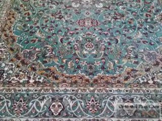 Green Rug with blue green & Real