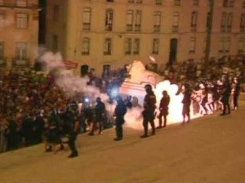 Clashes as protesters in Portugal demonstrate against tax hikes.