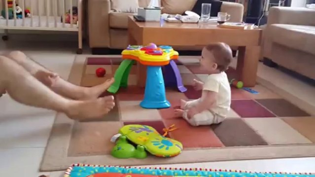 Baby Tommy Laughs as Dad Juggles