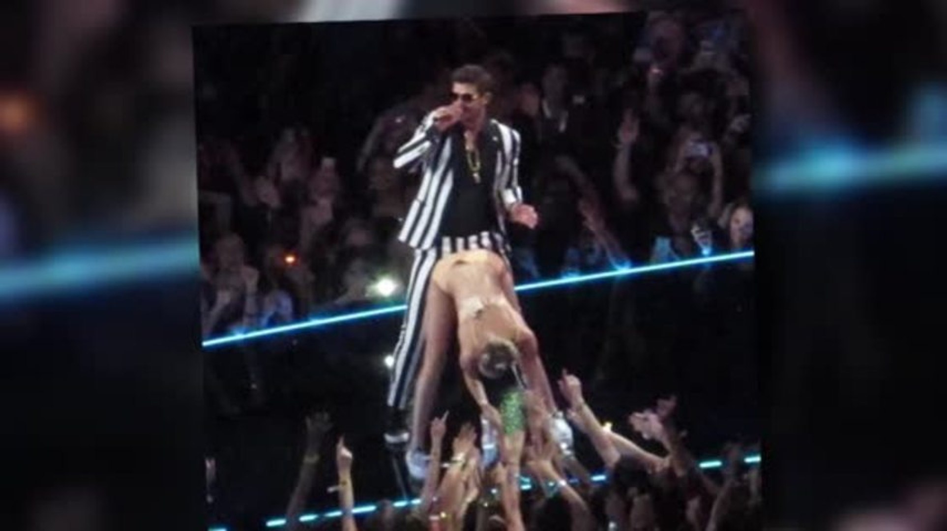 Miley Cyrus Uses a Foam Hand as a Sexual Prop at the MTV VMAs