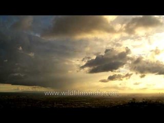 Time- lapse: Clouds in different colours running together