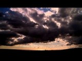 Time lapse: Grey clouds covering the sun