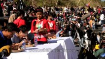 Nagaland-hornbill festival-Pork fat eating competition