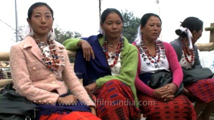 Nagaland-hornbill festival-Ao man smoking pipe
