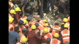 Dozens trapped in India building collapse