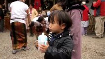 Nagaland-hornbill festival-kid drinking juice