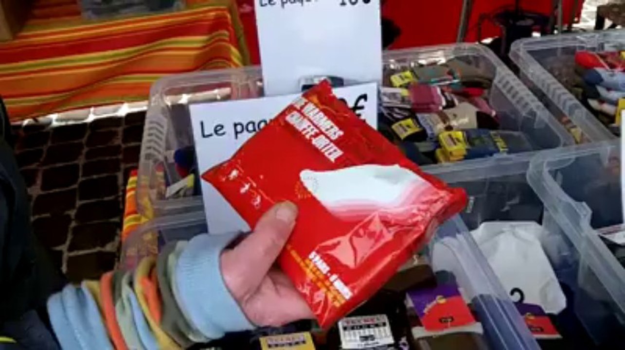 Une commerçante sur le marché d'Arlon