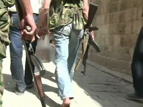 Fierce clashes in Syria as fire engulfs old souk